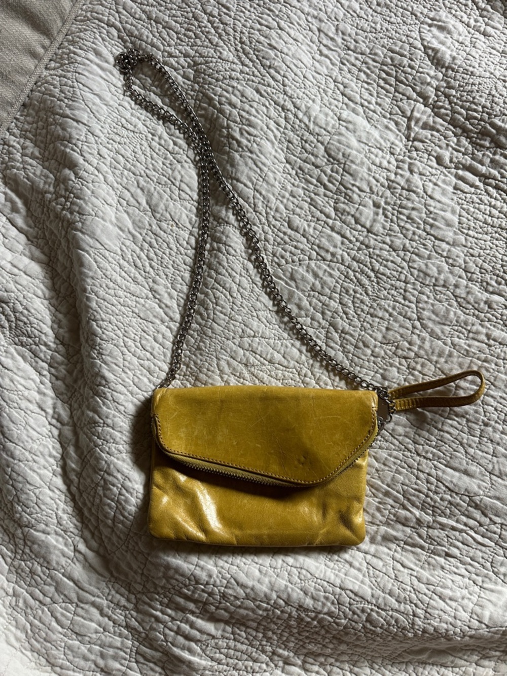 Hobo Daria Golden bag. 

Compact Yellow Leather Crossbody Bag with Chain Strap